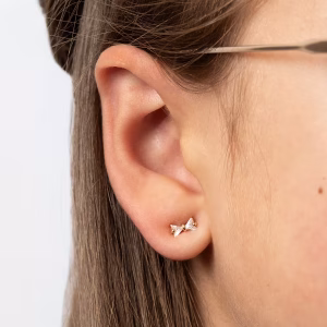 Tiny Gold Bow Studs With Crystal Insert
