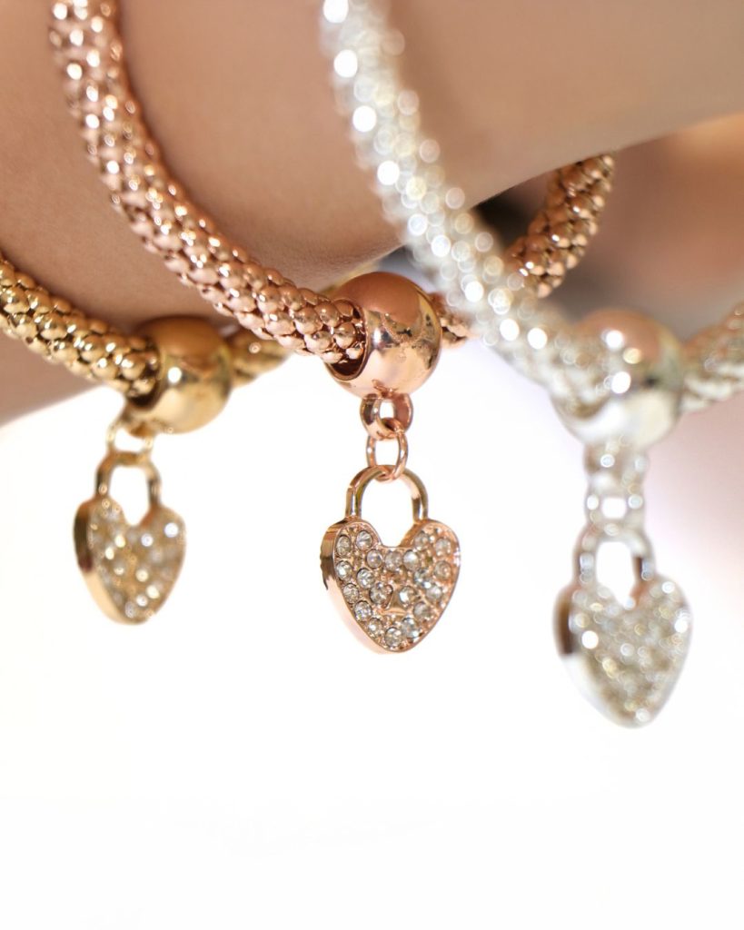 Home - tritone bracelet with heart charms